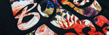 Échantillon de transfert Greenlight multicolore sur textile noir